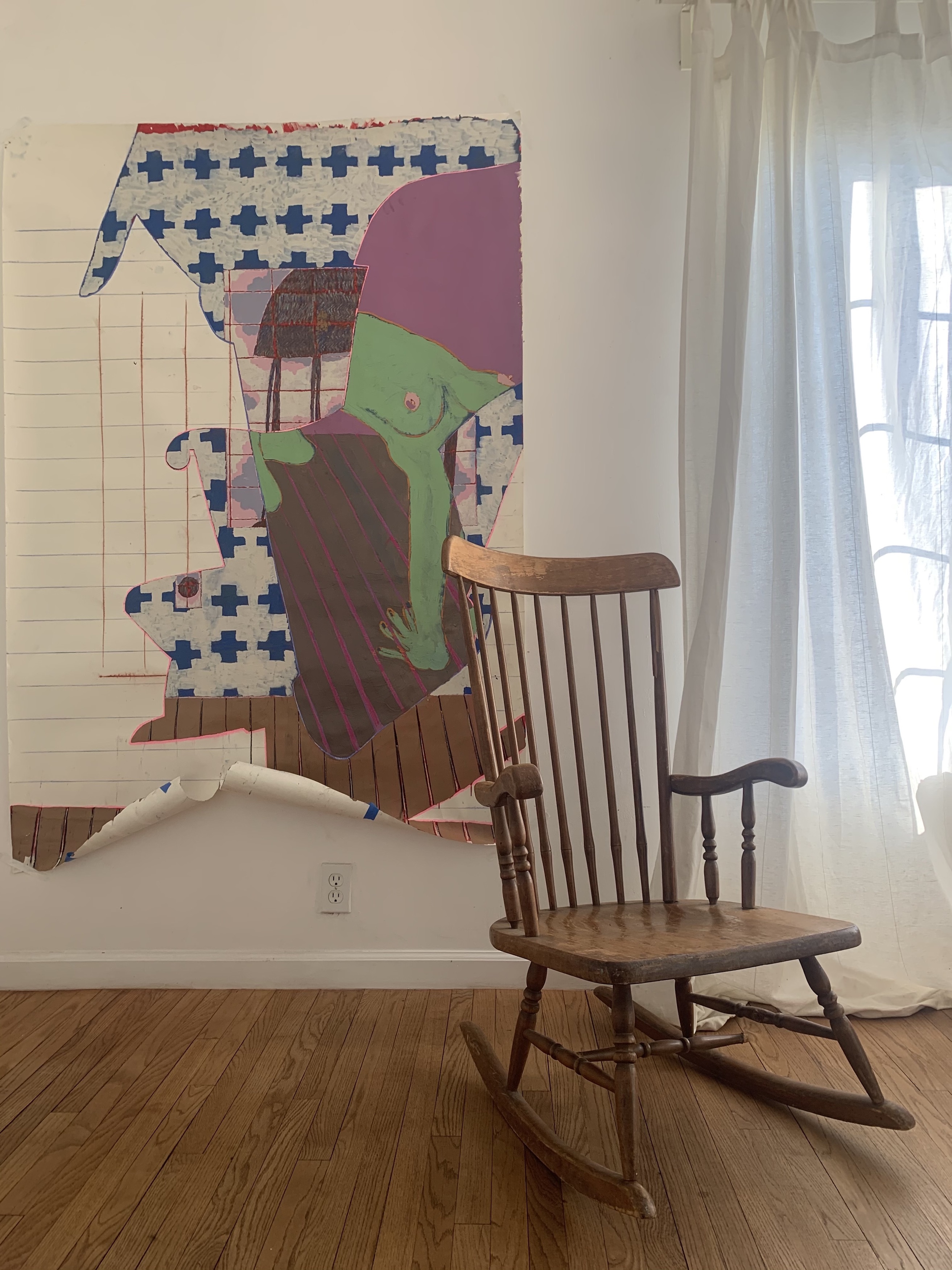 Image of a rocking chair with an abstracted portrait of the rocking chair
behind.